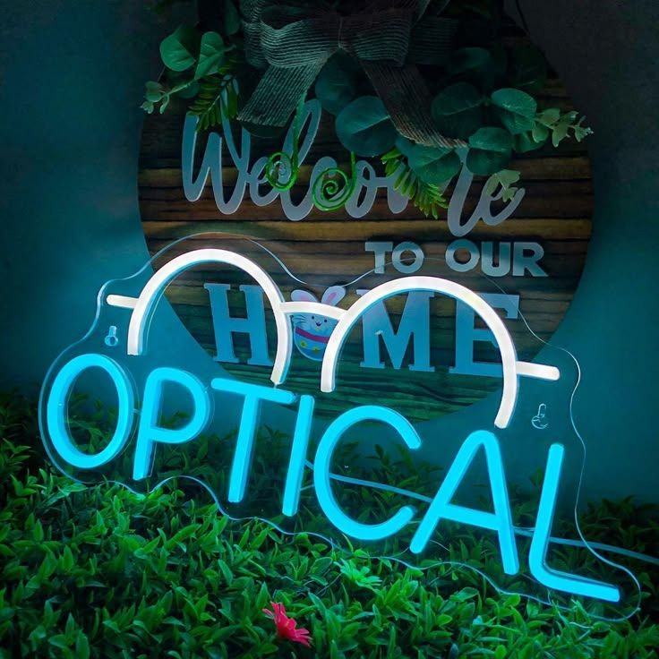 تابلو نئون فلکس مغازه عینک فروشی طرح فریم عینک سفید و متن Optical آبی روی پلکسی شفاف